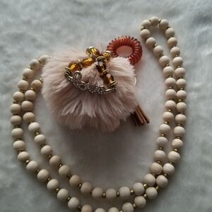 Elegant Beige Beaded Lanyard with Gold Charm